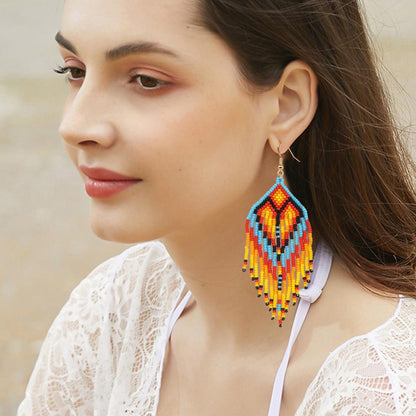 Go2bohoINS cross-border foreign trade temperament Bohemian ethnic wind earrings imported rice beads hand-woven tassel